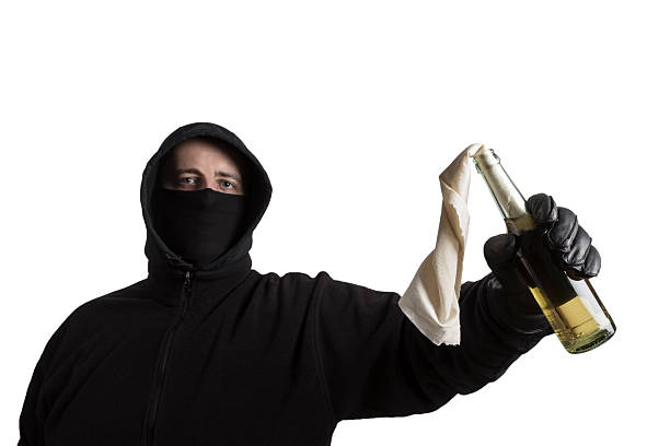 istock Black Block fellow with Molotov Cocktail 531714575