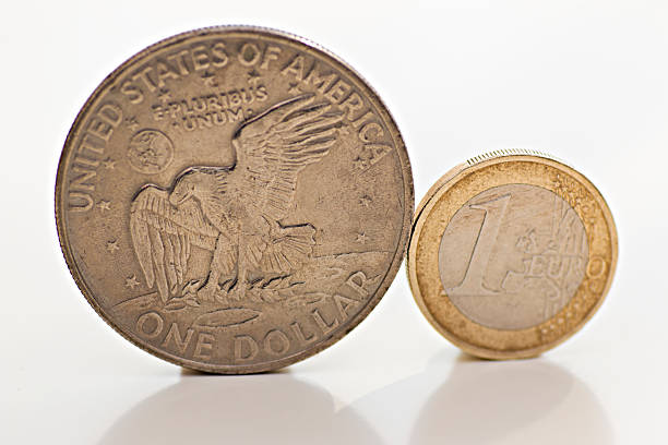 istock One Dollar and One Euro Coin 531714666