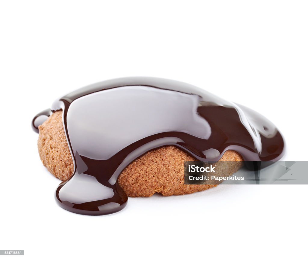 chocolate syrup and  cake sweet dessert food close up of a chocolate syrup on a cake on white background Baked Stock Photo