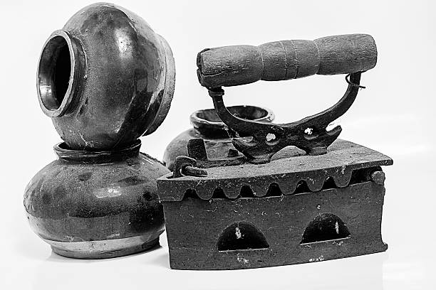 istock Old iron and old jar and Rocks on white background 531720731