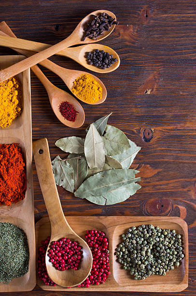 istock Colorful herbs,spices and aromatic ingredients  on wooden table. 531720935