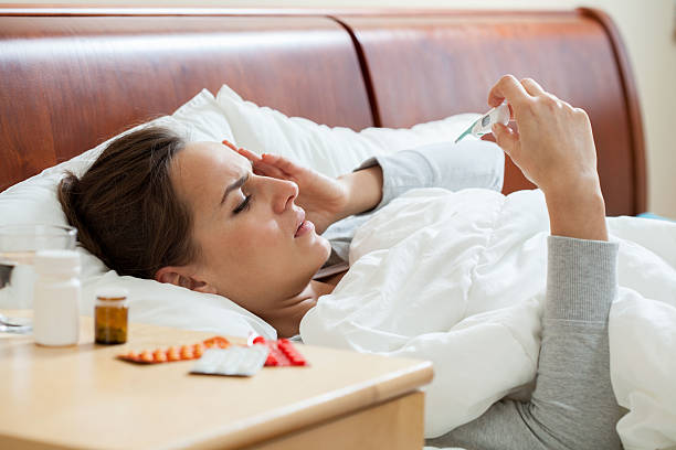 istock Having high fever woman 531721159