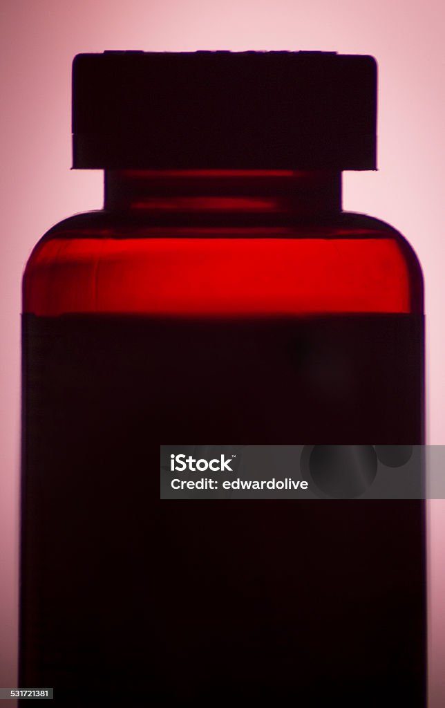 Vitamin pill bottle silhouette Vitamin pill bottle silhouette photo. 2015 Stock Photo