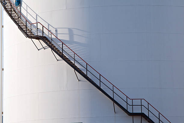 istock white tank in tank farm with blue sky 531721877