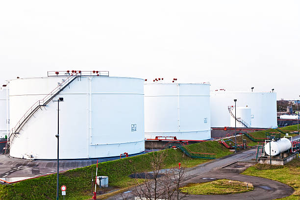 istock white tank in tank farm with blue sky 531721889
