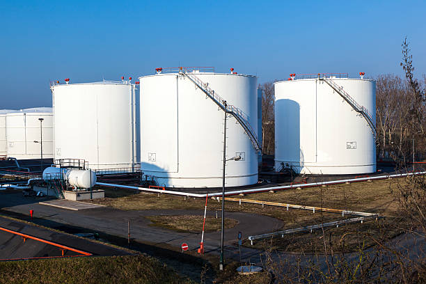 istock white tank in tank farm with blue sky 531721913