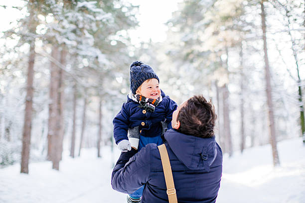 istock Father and son on the snow 531721965