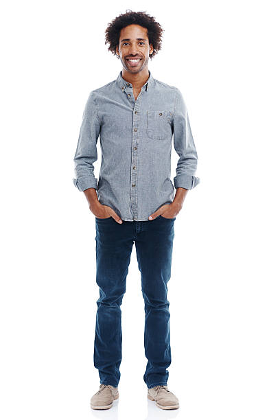 I never leave home without my smile Portrait of a smiling handsome man in studio isolated on whitehttp://195.154.178.81/DATA/shoots/ic_783849.jpg jeans photos stock pictures, royalty-free photos & images
