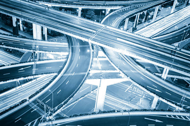 istock shanghai elevated road junction and interchange overpass at night 531725809