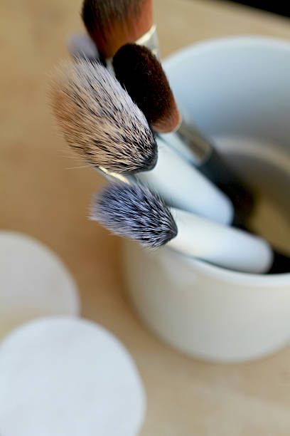 istock Make up brushes in the cup and cotton pads 531727319