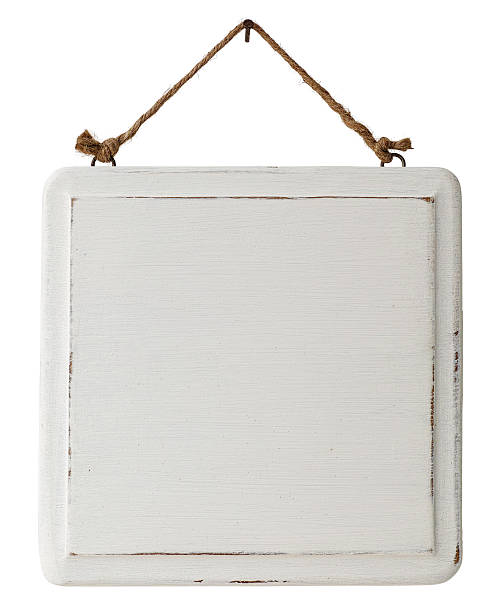 istock Old weathered white wood signboard. 531733907
