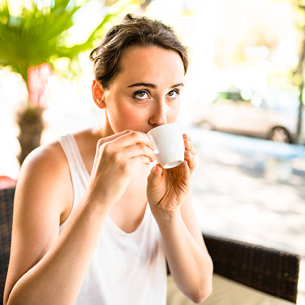 istock Woman drinking an espresso 531733915