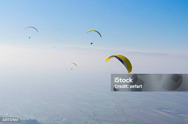 Paragliders In Extreme High Flight Stock Photo - Download Image Now - 2015, Activity, Adrenaline