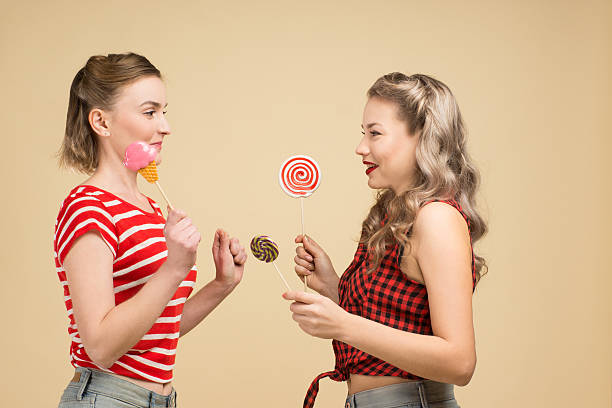 istock Girls with big candys 531737675