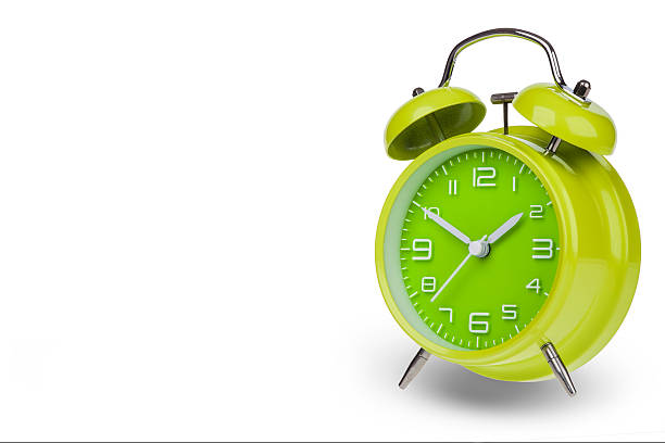 istock Green alarm clock with the hands at 10 and 2 531759709