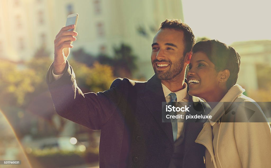 Let's make this last forever A young man taking a selfie with his girlfriend 2015 Stock Photo