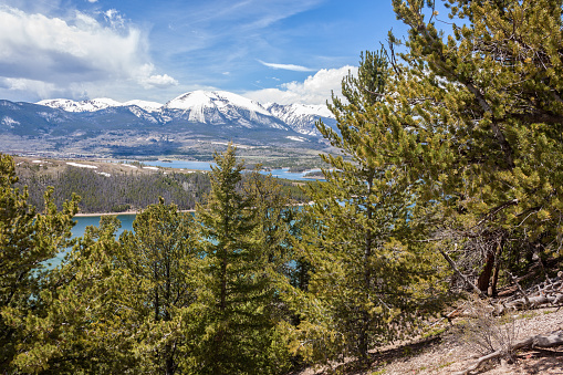 snow covered peaks are a backdrop for the colorado mountain landscape near dillon reservoir in summit county colorado in spring