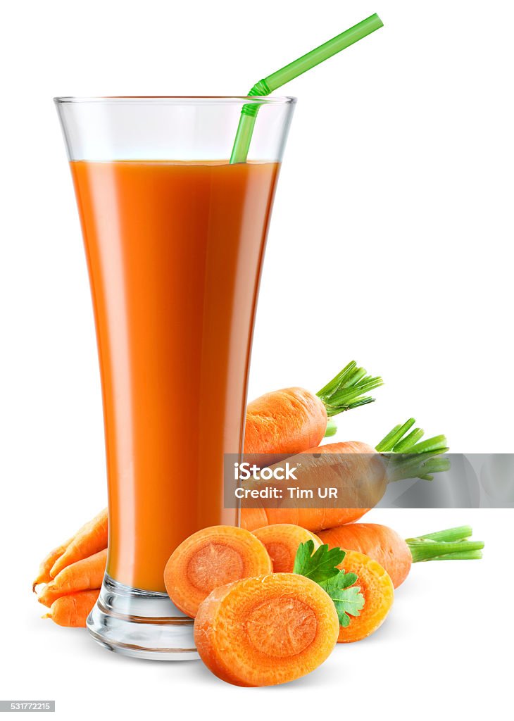 Glass of carrot juice with fruit isolated on white. Carrot Juice Stock Photo