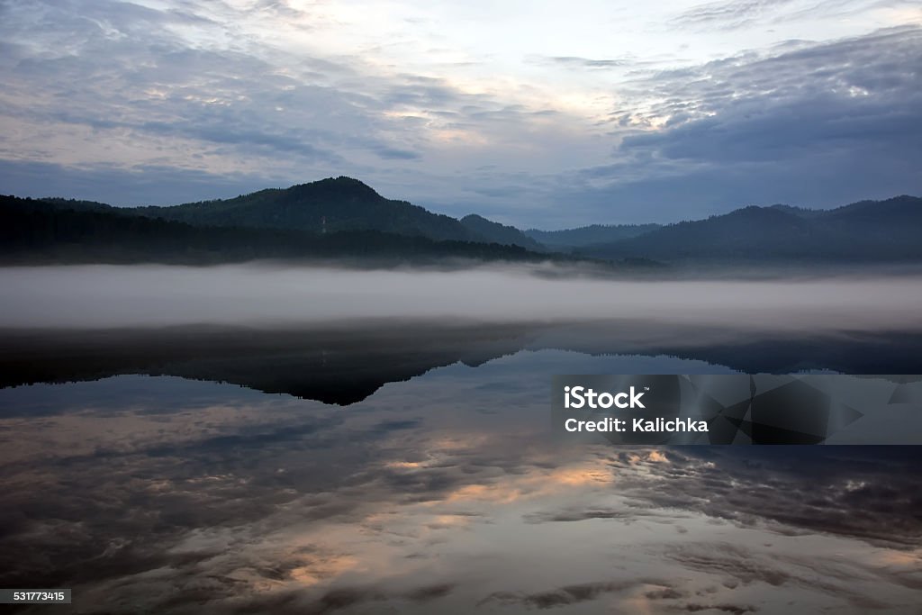 Sunrise at the Teletskoye lake Sunrise at the Teletskoye lake. Altai, Russia 2015 Stock Photo