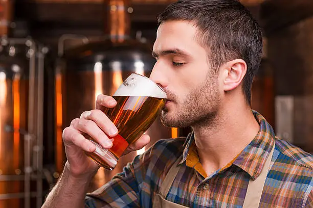 Photo of Tasting fresh brewed beer.