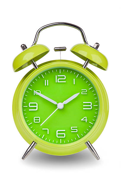 istock Green alarm clock with the hands at 10 and 2 531774283