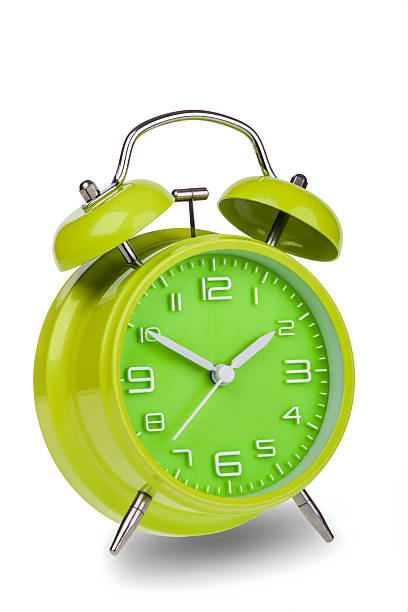 istock Green alarm clock with the hands at 10 and 2 531774833