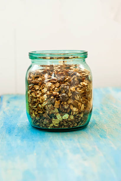 istock granola in the pot on a wooden board blue 531774973