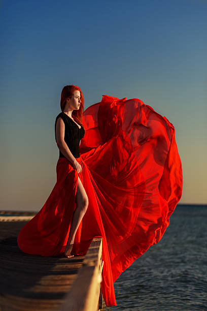 istock sunset wind in my dress 531775229
