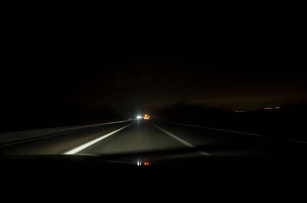 istock Driving on the night road, motion blur 531775740