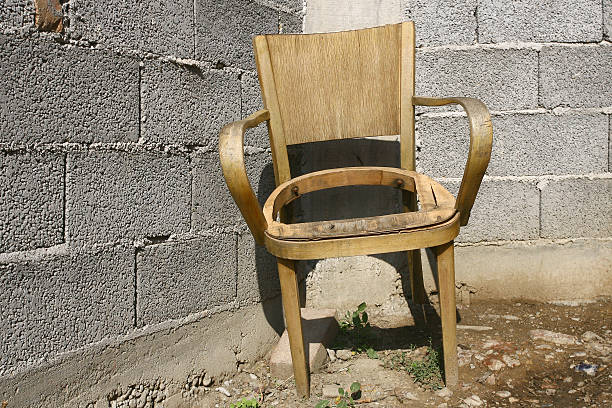 istock old chair near the old wall 531775837