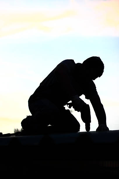 istock Man repairing roof 531775866