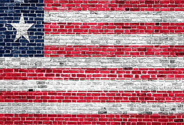 istock Flag of Liberia painted on brick wall, background texture 531776564