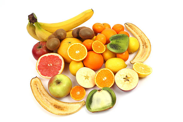 istock fresh fruits stacked together on white background 531777222