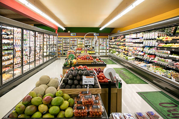 Grocery Store Produce Department Produce section in grocery store wide angle refrigerated section supermarket photos stock pictures, royalty-free photos & images