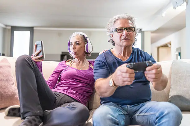 Young at heart grandparents series: Listening music and playing videogames