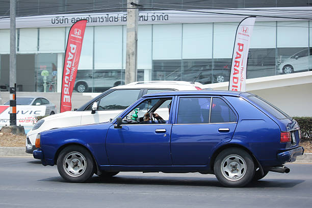 Private Old Car Mazda 323 Stock Photo - Download Image Now - Asia