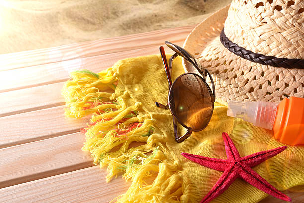 istock Beach articles on a table wooden slats elevated view 531779450
