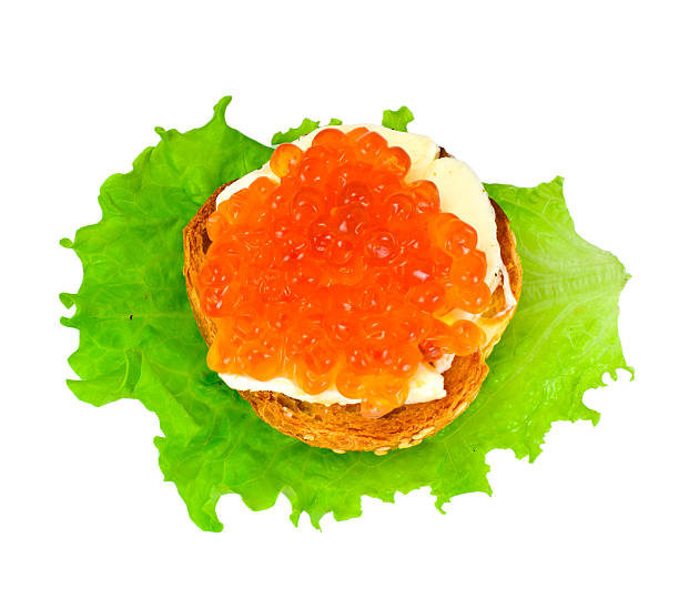 istock Sandwich with Salmon Caviar, Butter, Salad on Baguette 531781096