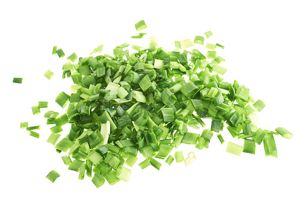 istock Pile of green onion cut in pieces 531781704