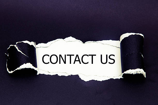 istock contact us word written under torn paper 531782800
