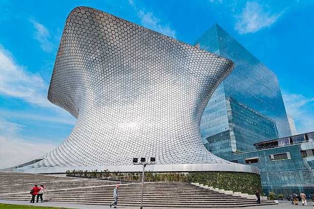 Museo Soumaya in Mexico City Mexico Mexico City, Mexico - January 19, 2016: Pedestrians walk by the Museo Soumaya in the Polanco neighborhood of Mexico City. museo stock pictures, royalty-free photos & images