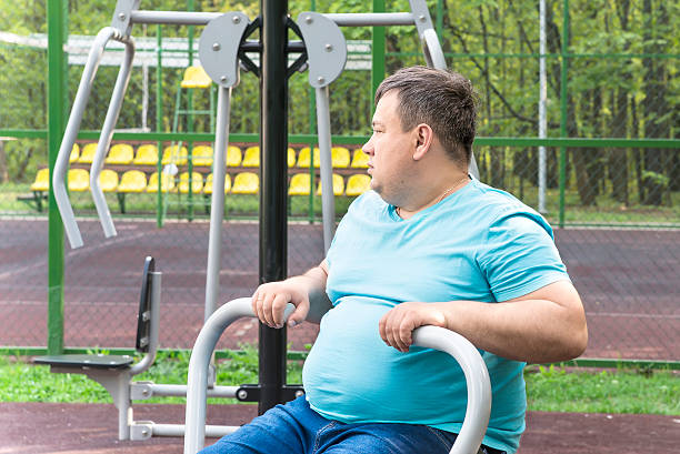 istock the man does exercises on the sports exercise machine 531786438