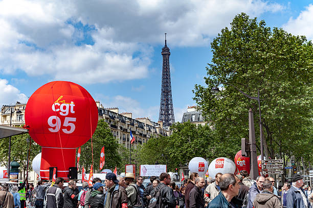 Protestors against Loi Travail Paris, France - May 17, 2016: Protestors during the strike against labor reform police tear gas stock pictures, royalty-free photos & images