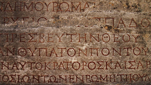 istock Photo ancient background letters carved in stone 531790380