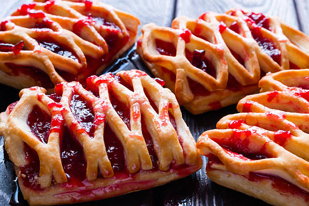 istock Strudel with jam on a black background closeup 531790612