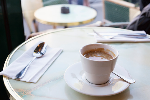 Coffee on a table, in a café in Paris