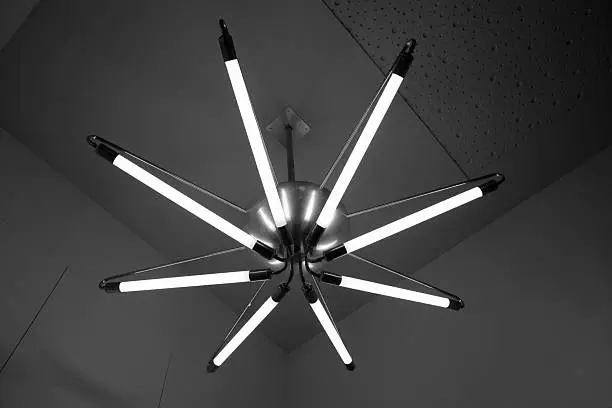 Photo of Modern LED strip lamp on ceiling