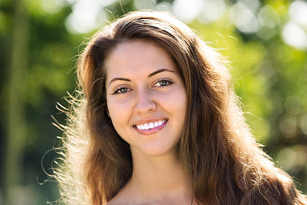 istock Smiling girl in summer park 531793842