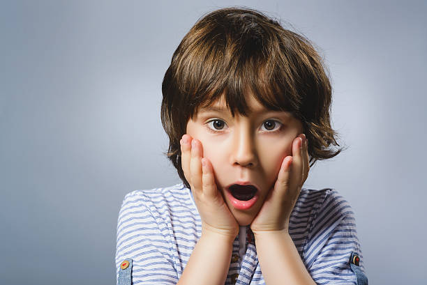 istock Closeup sad boy with worried stressed face expression 531794174