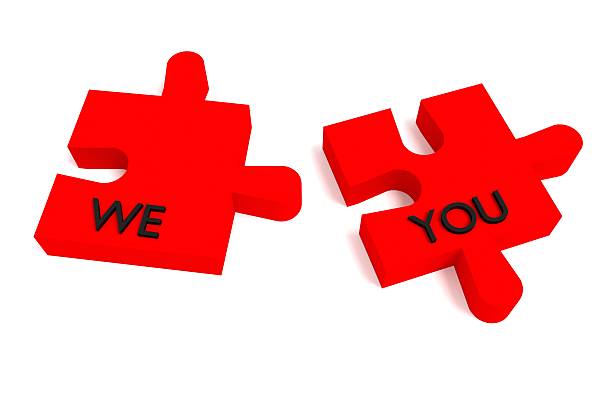 istock Red Puzzle, we and you on white background 531795804